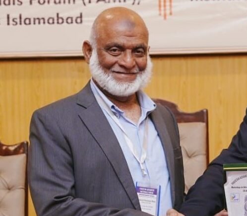 Dr. Anjum Tauqir - Director